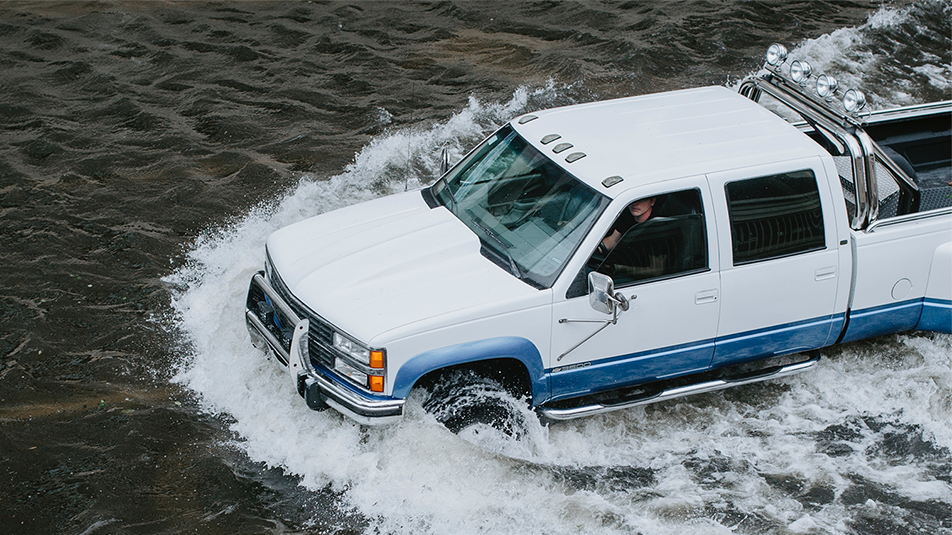 Truck driving in flood