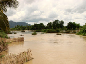 The Mekong River, which flows through China, Myanmar, Thailand, Laos, Cambodia and Vietnam provides water, fish, electricity, and more to millions that live in riverside communities. The damming of this river often disrupts life in these communities. Photo from Adam Jones on Flickr.