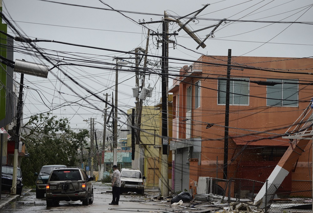 Power lines are down after the impact of Hurricane Maria, which hit the eastern region of the island in Humacao, Puerto Rico, Wednesday, Sept. 20, 2017. (AP Photo/Carlos Giusti)