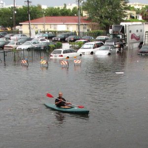 Flooding in South Beach, Miami - Flickr/Maxstrz